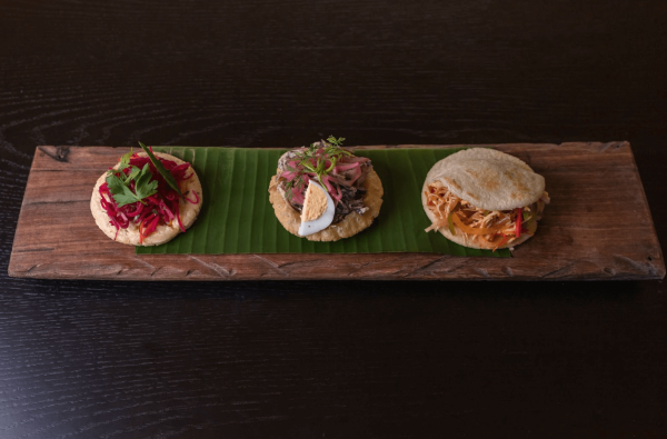 three tosadas on serving board at mayakoba restaurant